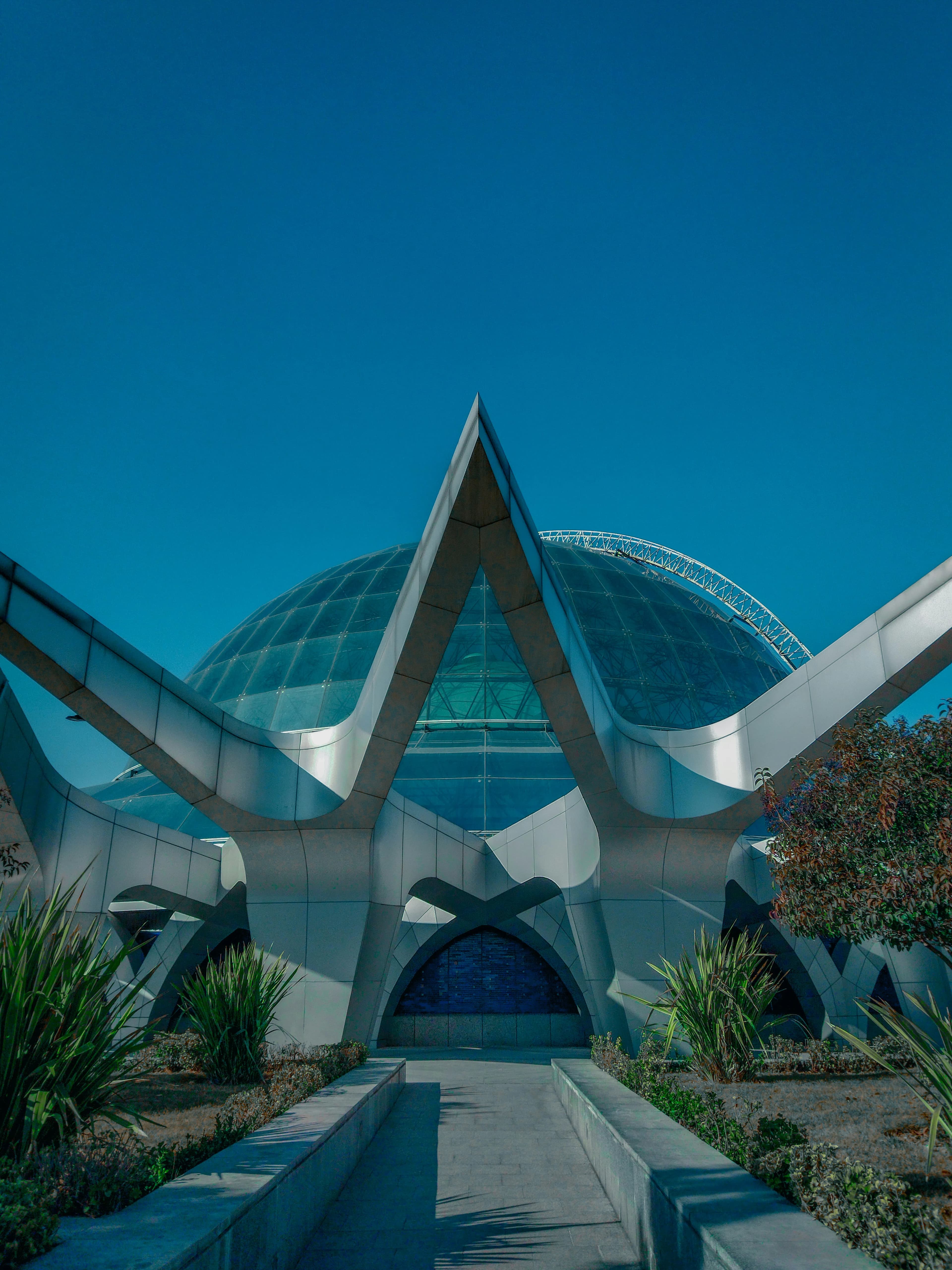 Geometric glass and steel structural architecture with angular modern facade
